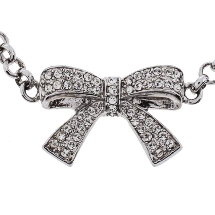 Pre Owned Aigner Silver Tone Crystal Embellished Bow Toggle Bracelet