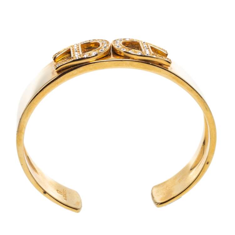 Pre Owned Aigner Crystal Studded Logo Gold Tone open Cuff Bracelet