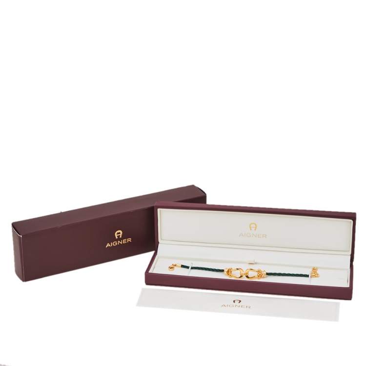 Pre Owned Aigner A Logo Crystal Gold Tone Silk Cord Bracelet 