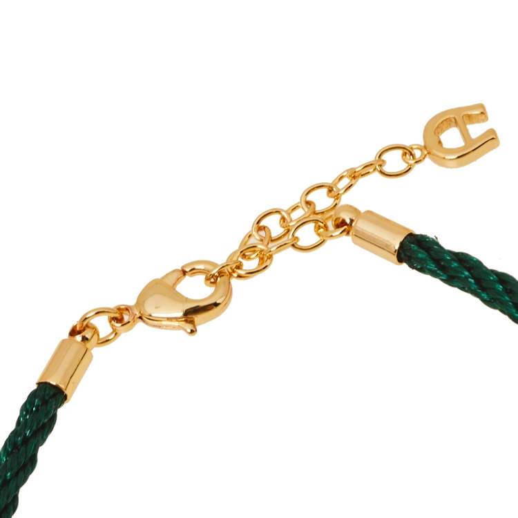 Pre Owned Aigner A Logo Crystal Gold Tone Silk Cord Bracelet 