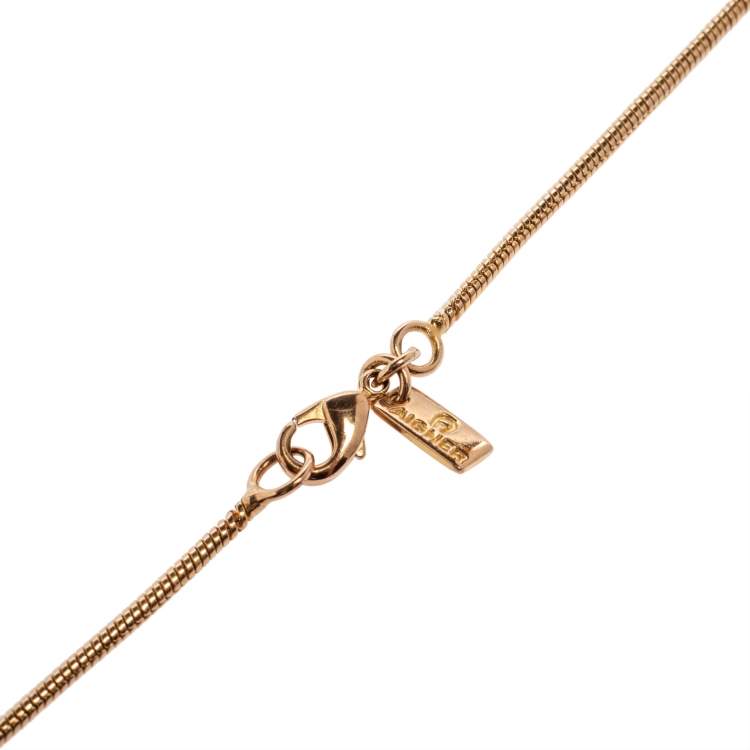 Pre Owned Aigner Gold Tone Crystal Logo Pendant Necklace
