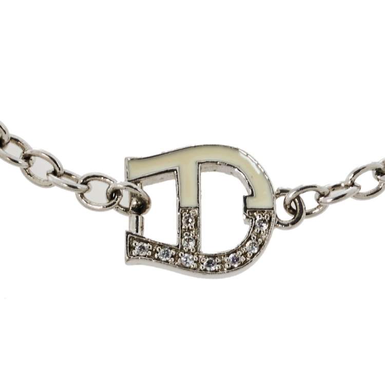 Pre Owned Aigner Silver Tone Crystal and Enamel Logo Toggle Bracelet 