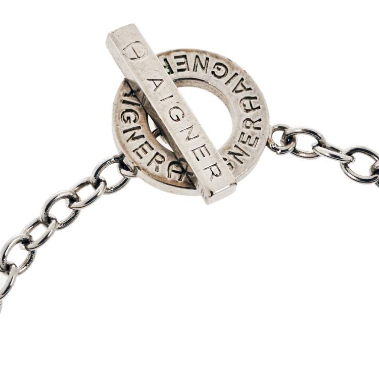 Pre Owned Aigner Silver Tone Crystal and Enamel Logo Toggle Bracelet 