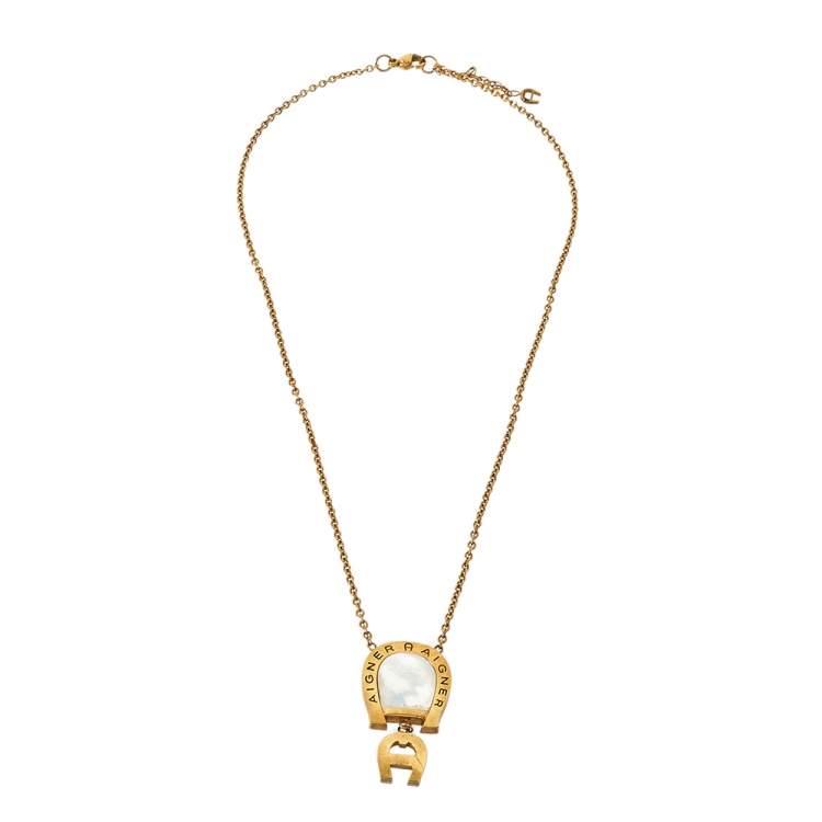 Pre Owned Aigner Gold Tone Mother of Pearl Crystal Logo Pendant Necklace