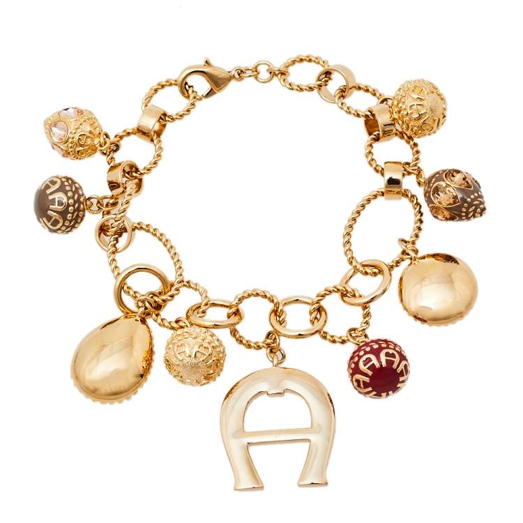 Pre Owned Aigner Crystal Gold Tone Charm Bracelet