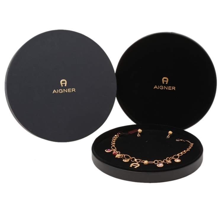 Pre Owned Aigner Crystal Charms Logo Drop Necklace & Earrings Set