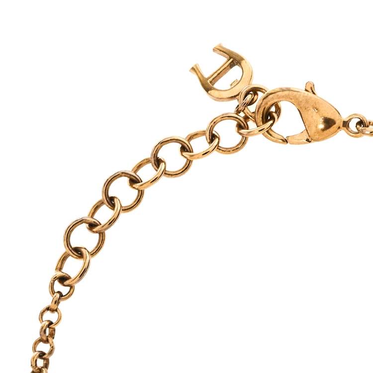 Pre Owned Aigner Rose Gold Tone Crystal Logo Bracelet