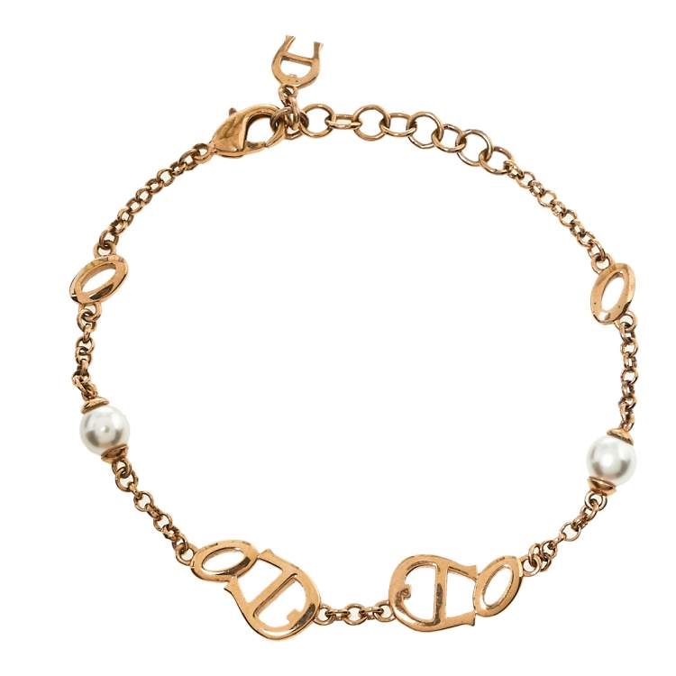 Pre Owned Aigner Rose Gold Tone Crystal Logo Bracelet