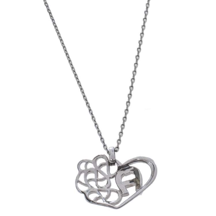 Pre Owned Aigner Silver Tone Crystal Logo Heart Pendant Necklace