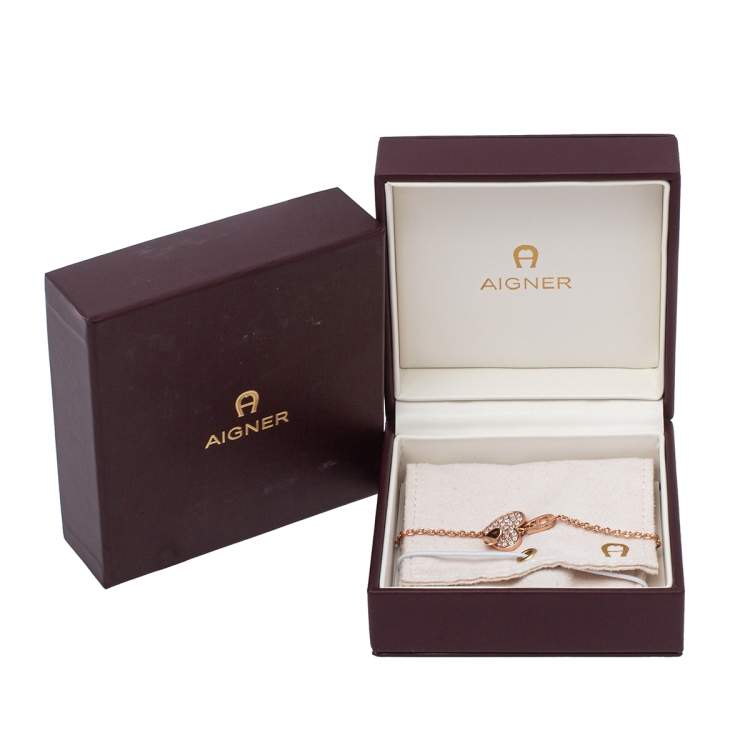 Pre Owned Aigner Rose Gold Tone Crystal Heart Logo Bracelet