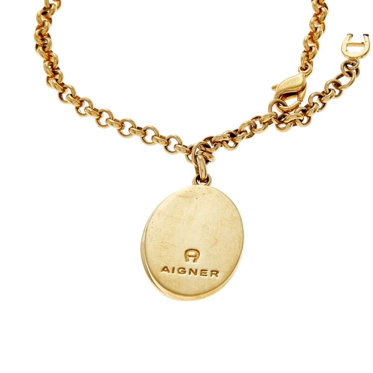 Pre Owned Aigner Gold Tone Enamel & Crystal Logo Charm Bracelet