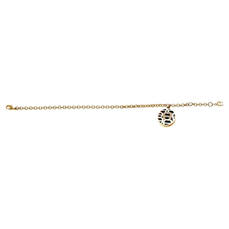 Pre Owned Aigner Gold Tone Enamel & Crystal Logo Charm Bracelet