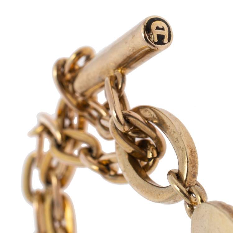 Pre Owned Aigner Gold Tone Logo Pendant Toggle Necklace