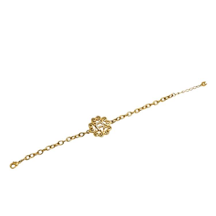 Pre Owned Aigner Gold Tone Crystal Logo Bracelet 