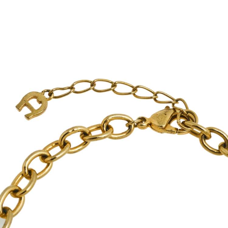 Pre Owned Aigner Gold Tone Crystal Logo Bracelet 