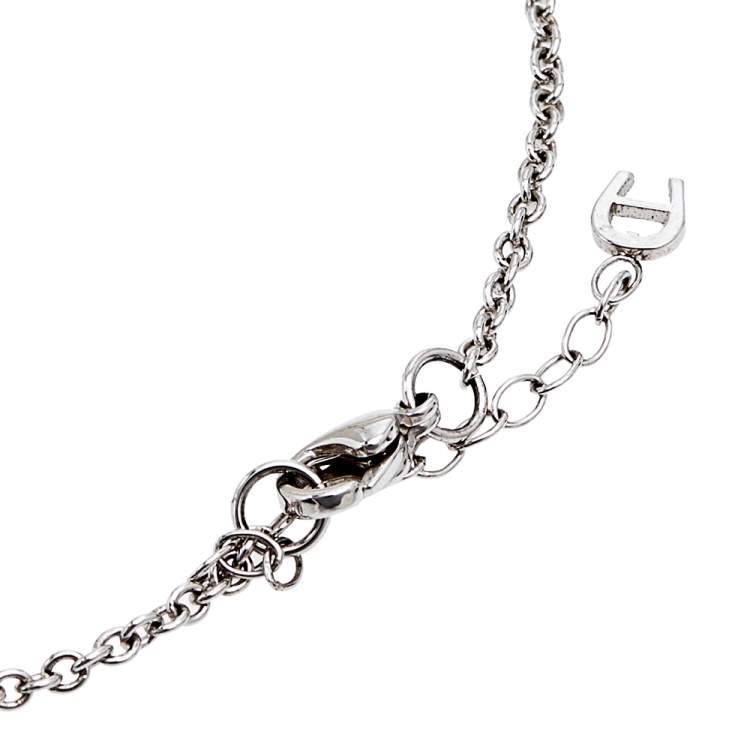 Pre Owned Aigner Silver Tone Crystal Logo Drop Pendant Necklace
