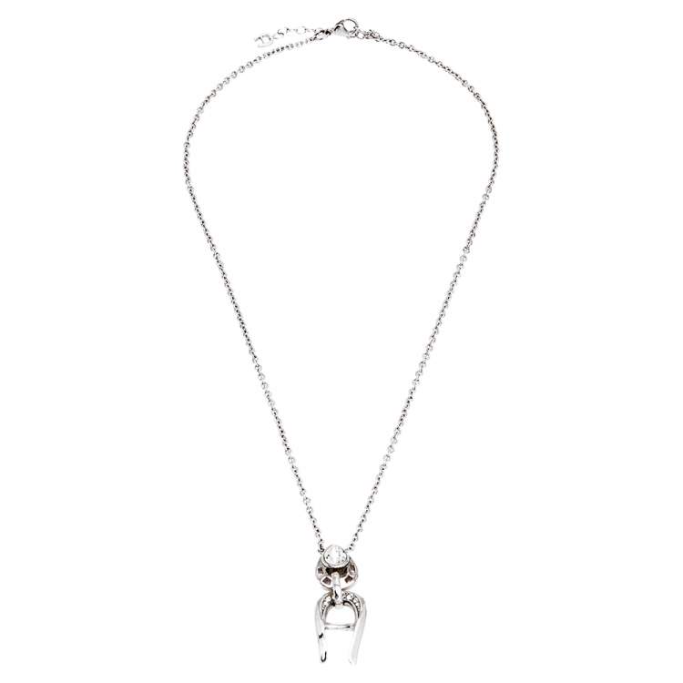 Pre Owned Aigner Silver Tone Crystal Logo Drop Pendant Necklace