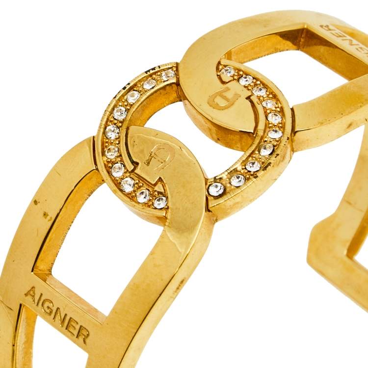Pre Owned Aigner Crystal Studded Logo Gold Tone Open Cuff Bracelet