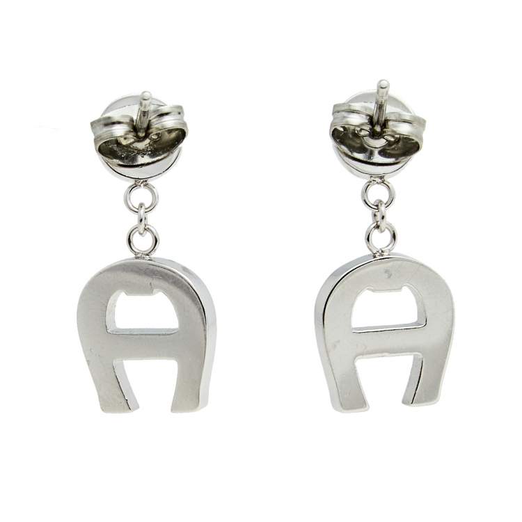 Pre Owned Aigner Silver Tone Crystal Logo Drop Earrings