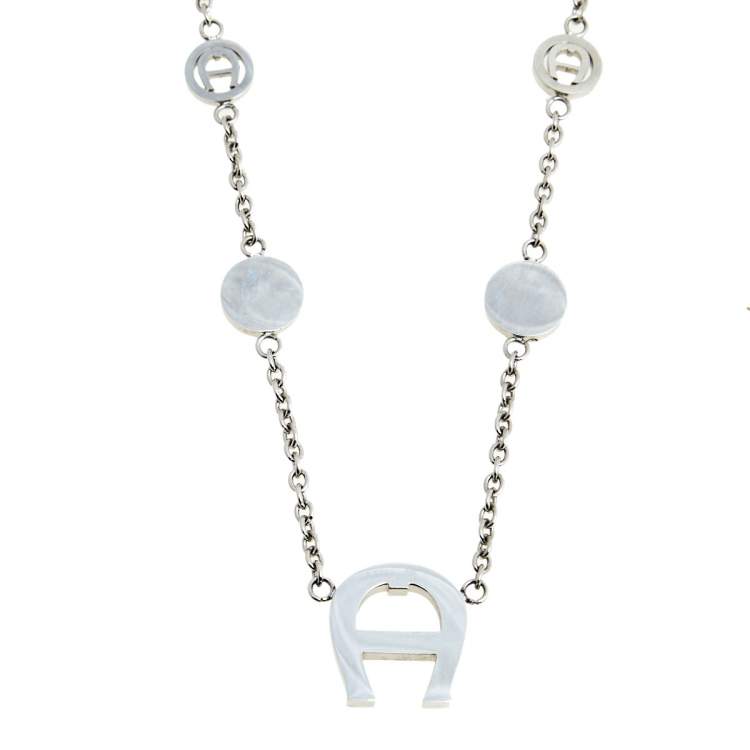 Pre Owned Aigner Silver Tone Crystal Logo Pendant Station Necklace