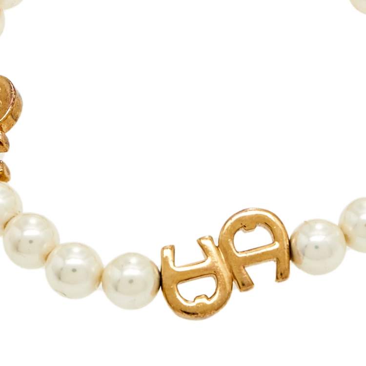 Pre Owned Aigner Gold Tone Faux Pearl Toggle Bracelet