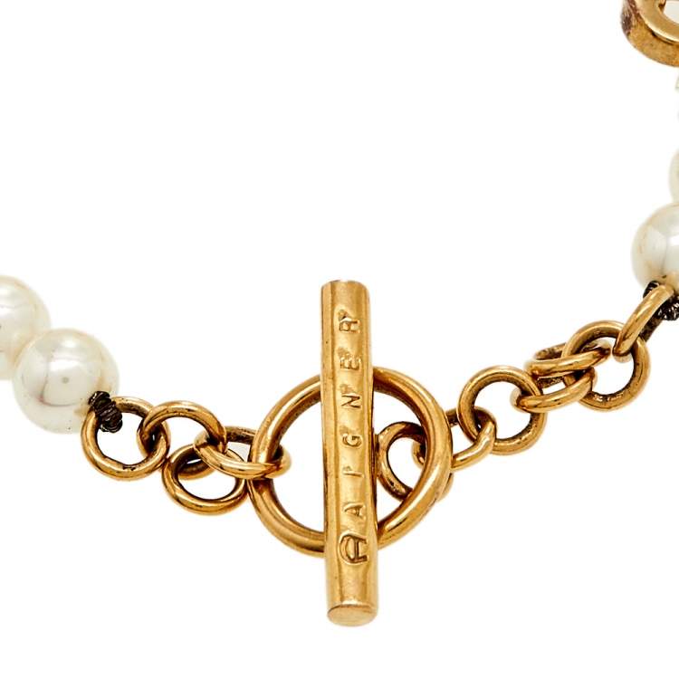 Pre Owned Aigner Gold Tone Faux Pearl Toggle Bracelet