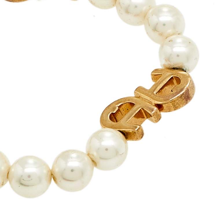 Pre Owned Aigner Gold Tone Faux Pearl Toggle Bracelet