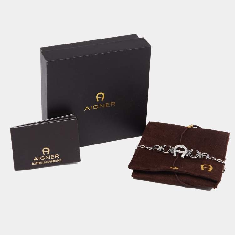 Pre Owned Aigner Silver Tone Crystal Logo & Horseshoe Bracelet