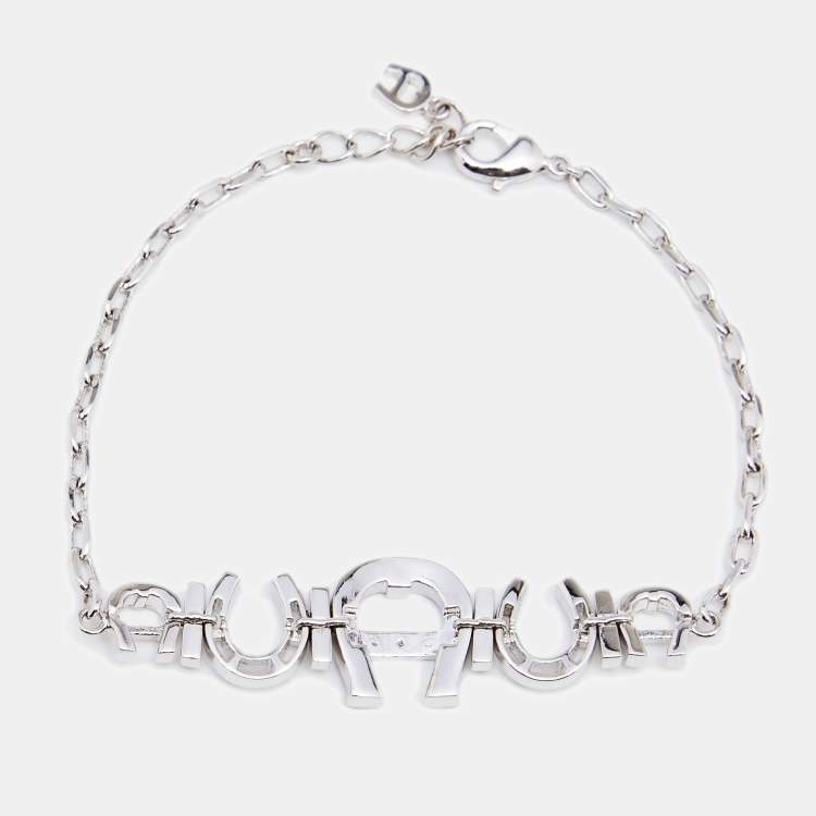 Pre Owned Aigner Silver Tone Crystal Logo & Horseshoe Bracelet