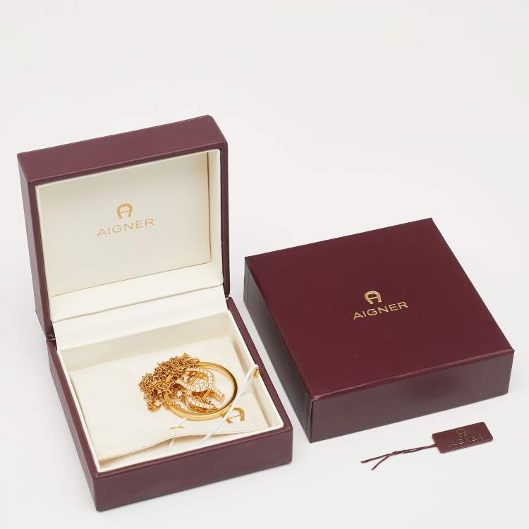 Pre Owned Aigner Double-A Logo Crystal Gold Tone Metal Circular Pendant Necklace