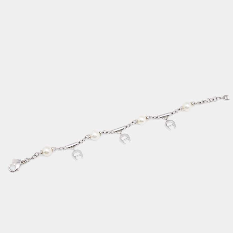 Pre Owned Aigner Silver Tone Logo Charms Pearl Station Bracelet
