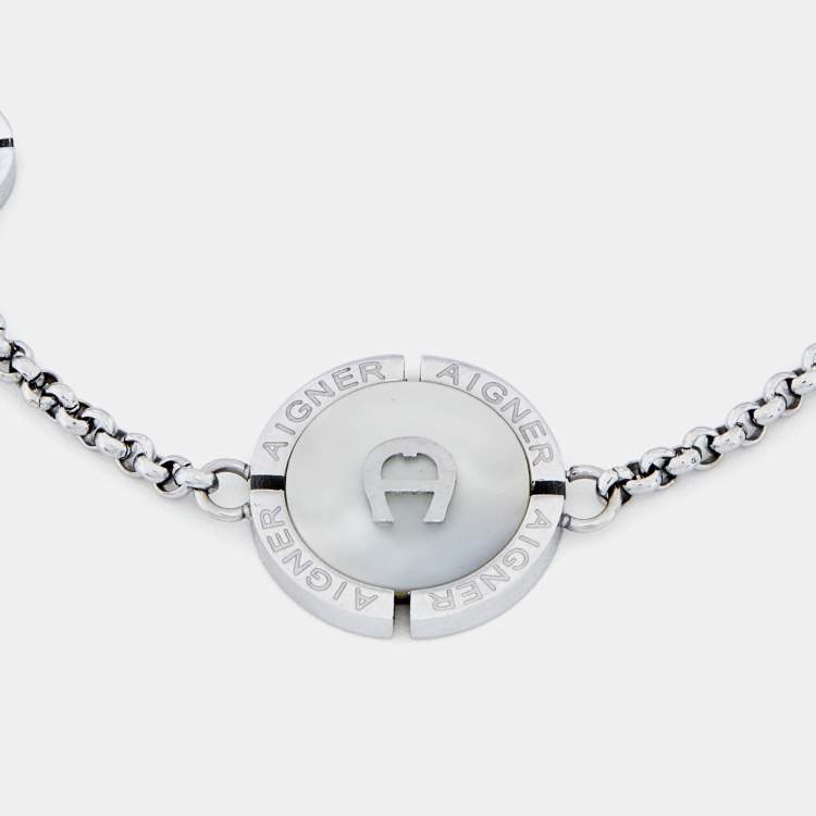 Pre Owned Aigner Silver Tone Mother of Pearl Logo Bracelet