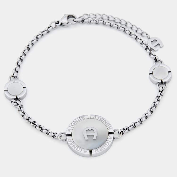 Pre Owned Aigner Silver Tone Mother of Pearl Logo Bracelet