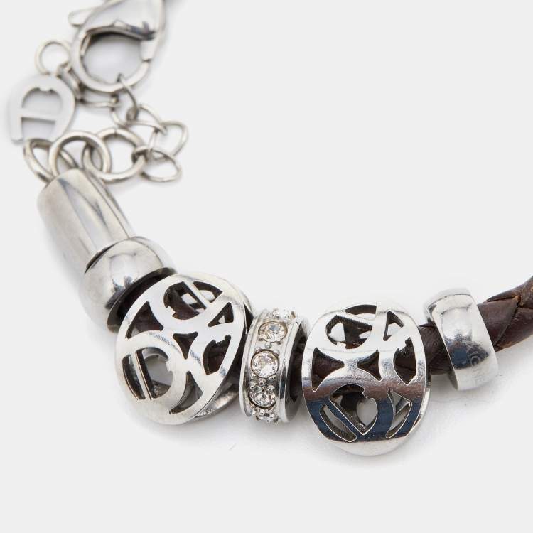 Pre Owned Aigner Crystal Logo Charm Brown Braided Leather Bracelet 
