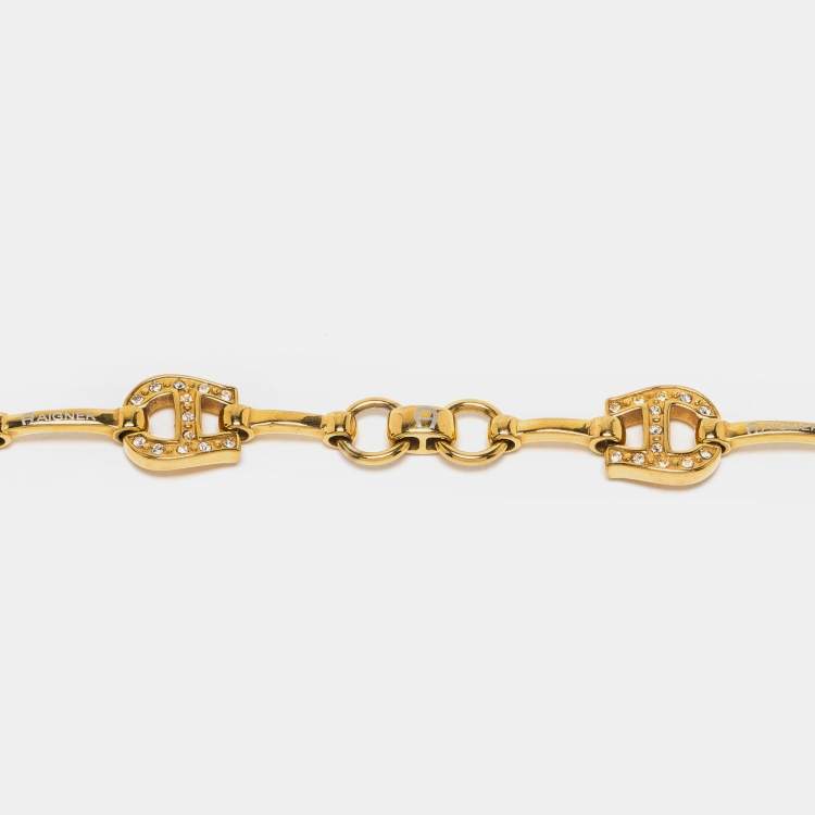 Pre Owned Aigner Gold Tone Crystal Logo Station Bracelet