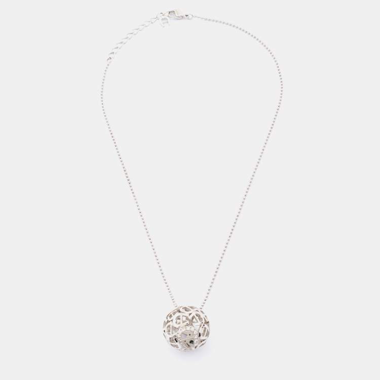 Pre Owned Aigner Silver Tone Crystal Logo Hollow Ball Pendant Necklace