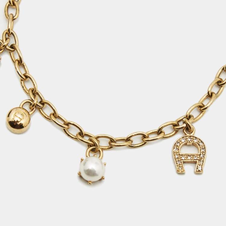 Pre Owned Aigner Crystals Faux Pearl Gold Tone Bracelet