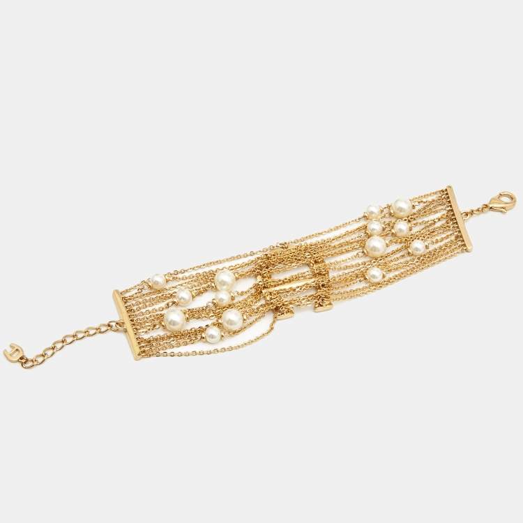 Pre Owned Aigner Capri Faux Pearl & Crystal Logo Gold Tone Bracelet