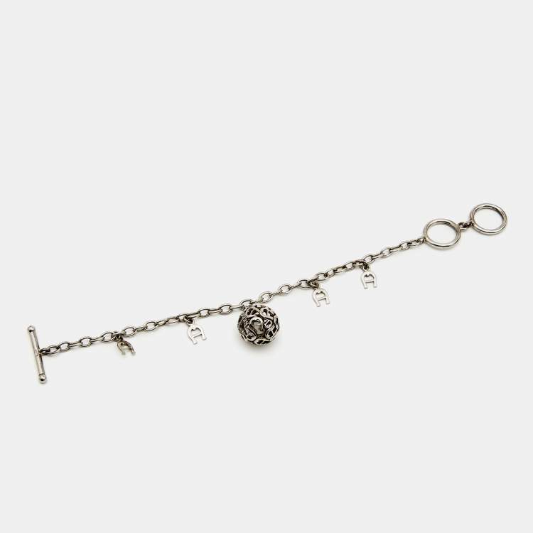Pre Owned Aigner Sterling Silver Crystal Logo Charm Bracelet