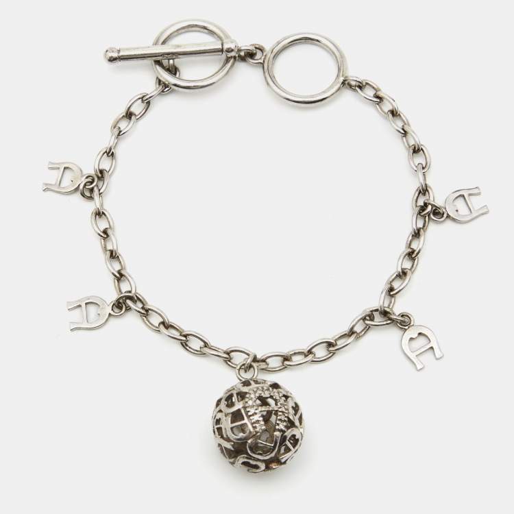 Pre Owned Aigner Sterling Silver Crystal Logo Charm Bracelet