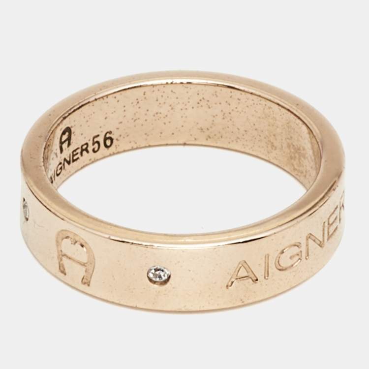 Pre Owned Aigner Crystals Gold Tone Band Ring Size 56