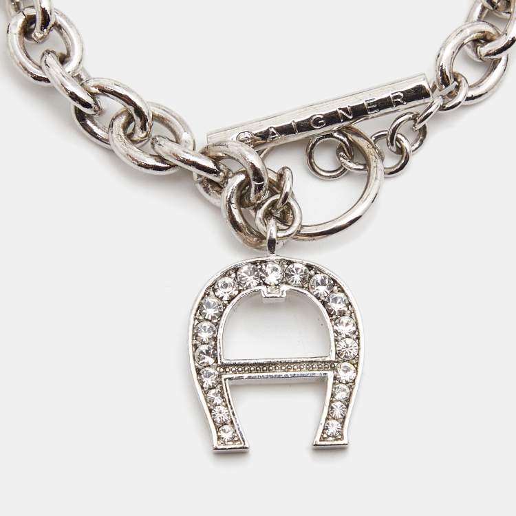 Pre Owned Aigner Crystals SIlver Tone Charm Bracelet