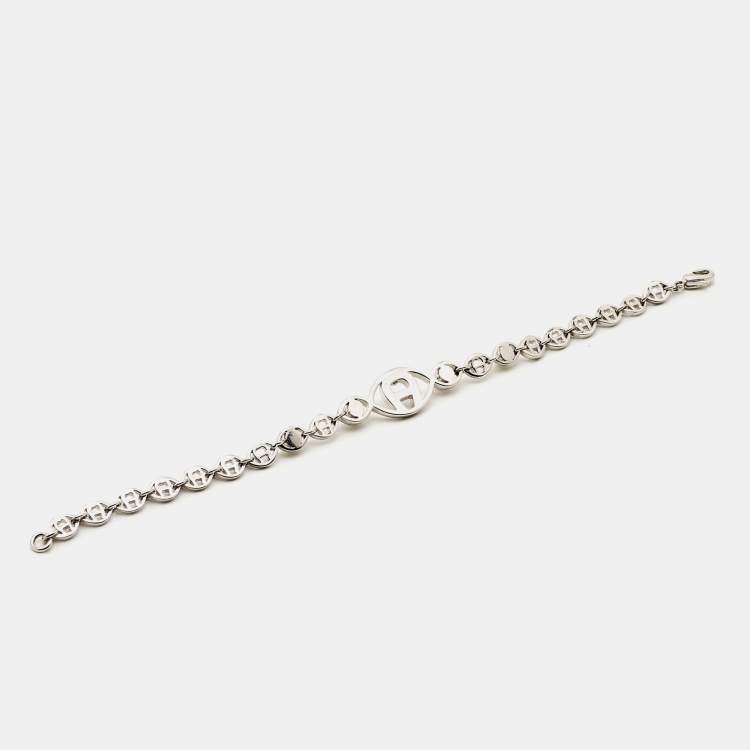 Pre Owned Aigner Logo Crystal Faux Pearl Silver Tone Bracelet