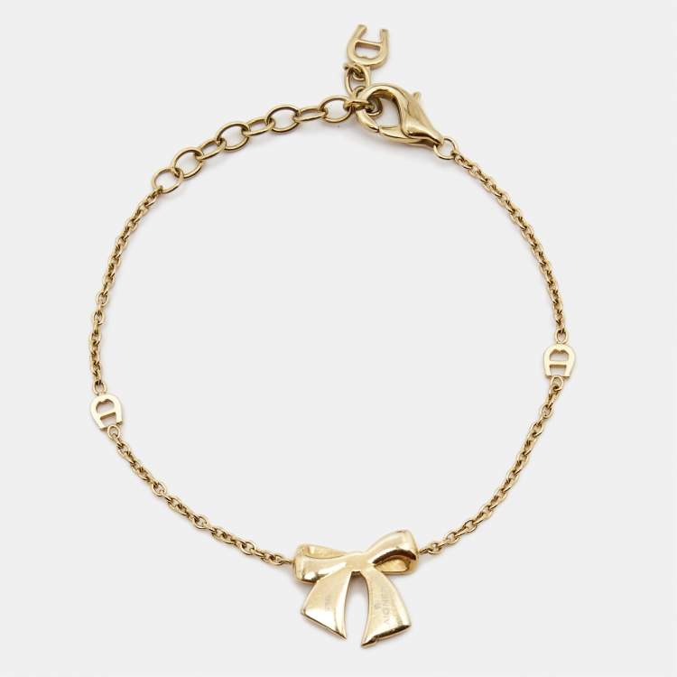 Pre Owned Aigner Bow Crystals Gold Tone Bracelet