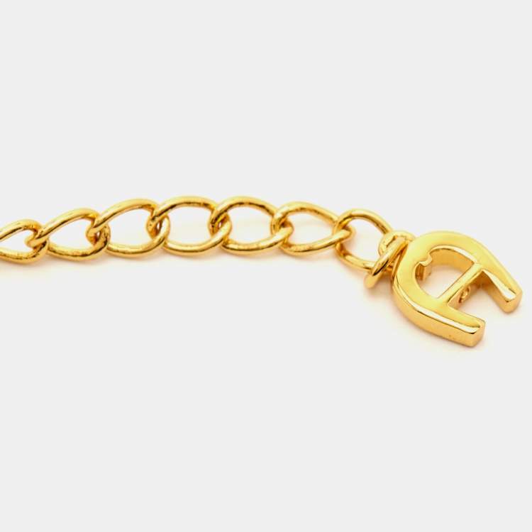 Pre Owned Aigner Love Mother of Pearl Crystals Gold Tone Bracelet