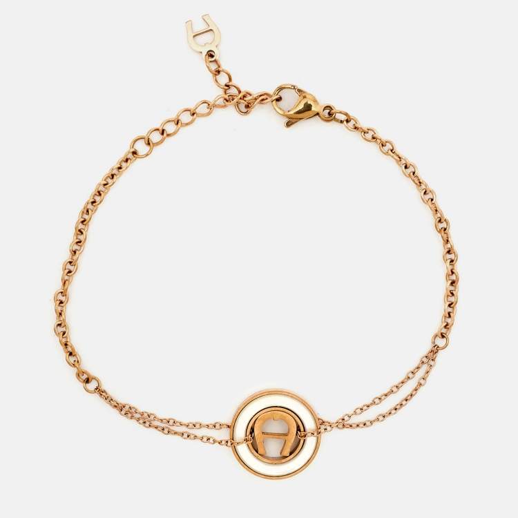 Pre Owned Aigner Bella Mother of Pearl Gold Tone Bracelet