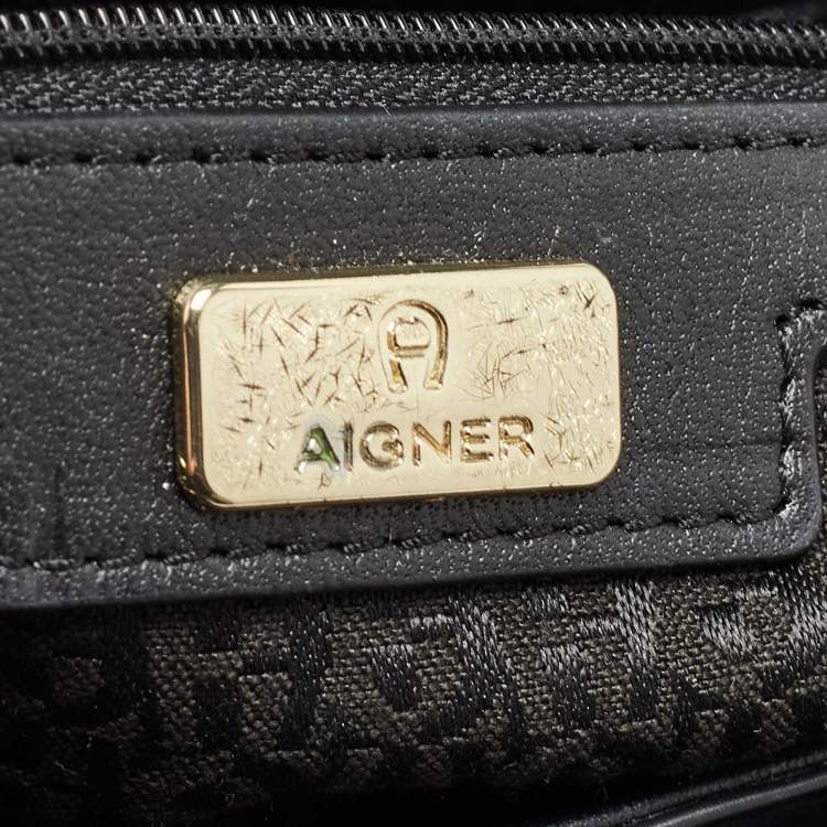 Pre Owned Aigner Black Logo Embossed Leather Genoveva Top Handle Bag