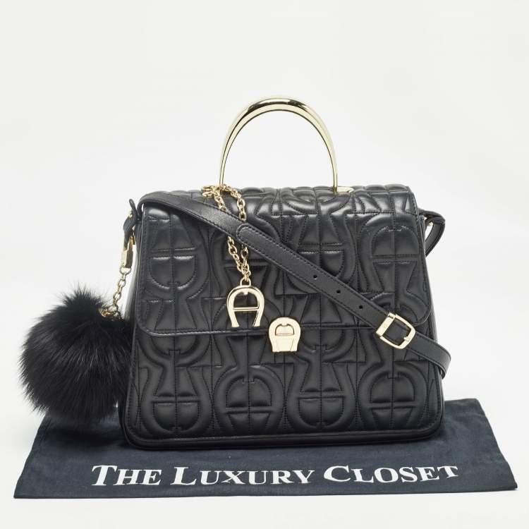 Pre Owned Aigner Black Logo Embossed Leather Genoveva Top Handle Bag
