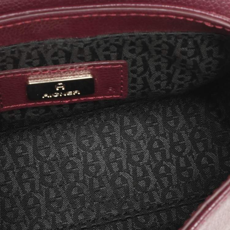 Pre Owned Aigner Burgundy Leather Embellished Top Handle Bag