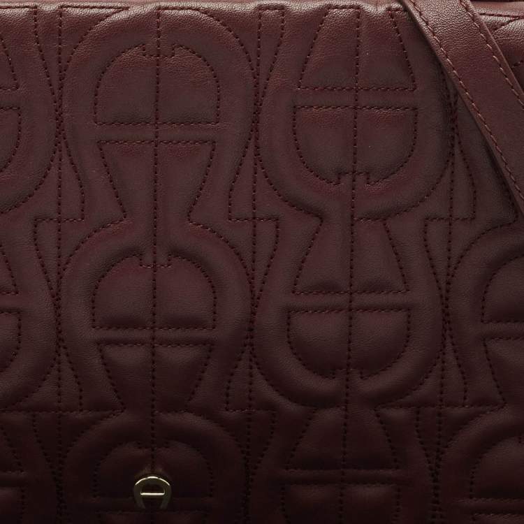 Pre Owned Aigner Burgundy Logo Embossed Leather Flap Crossbody Bag